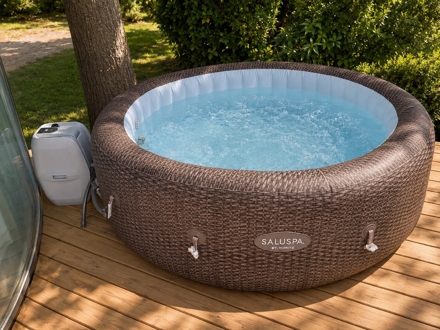 Woven outdoor hot tub on a wooden deck surrounded by trees at a Catskill NY spa
